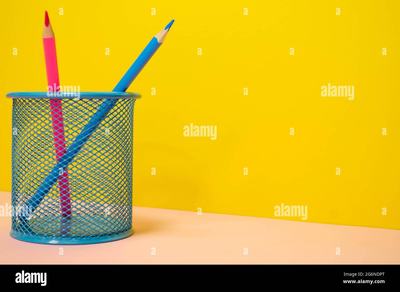 colored pencils in pencil holder Stock Photo - Alamy