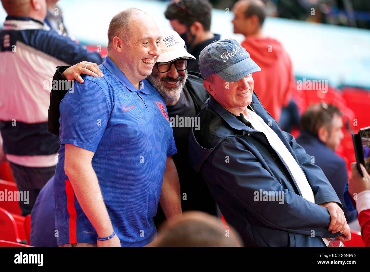 Frank Skinner and David Baddiel pose for pictures in the stands with