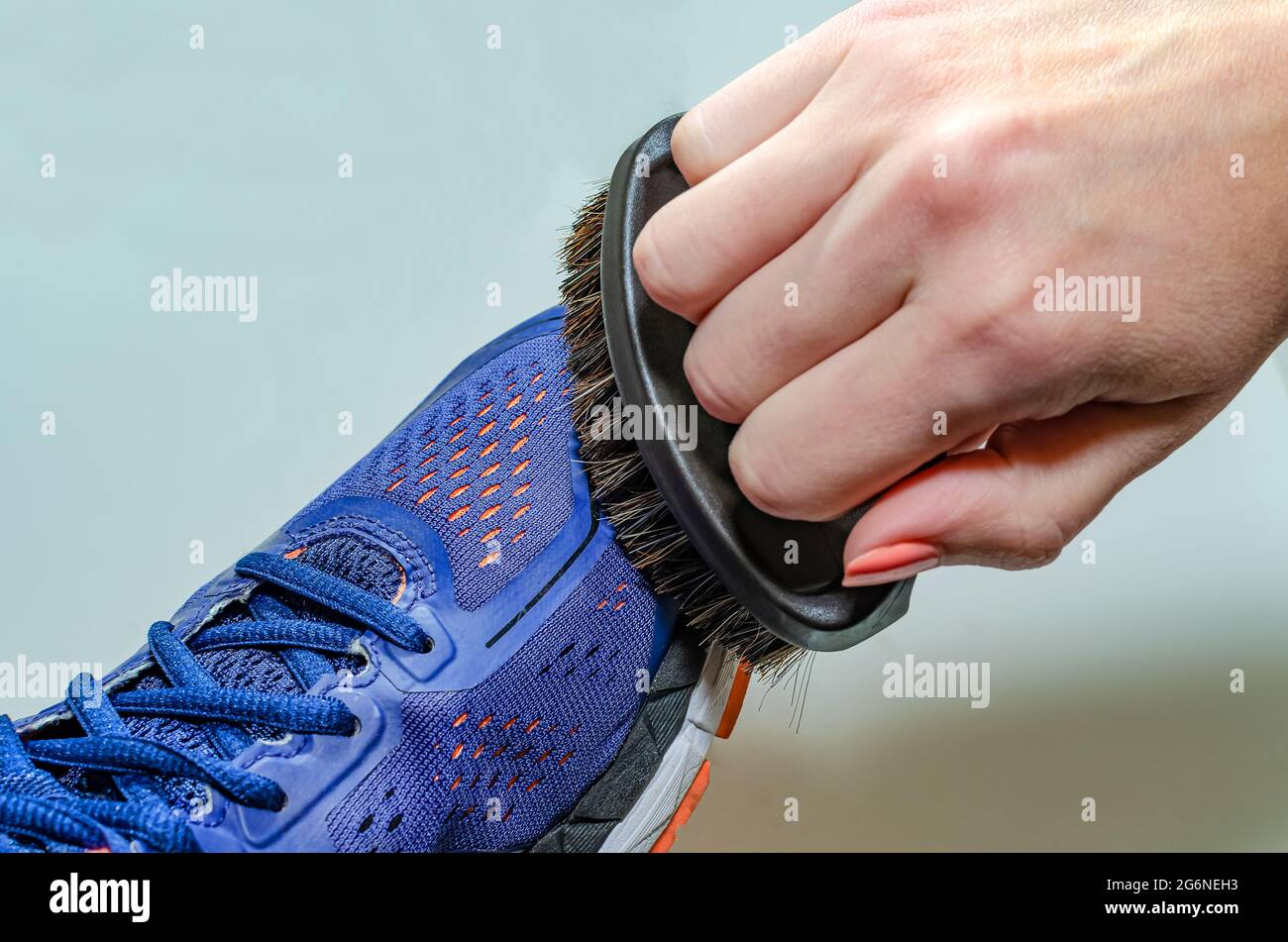 Cleaning dirty sneakers after training. Wash dirty sneakers. Wash your