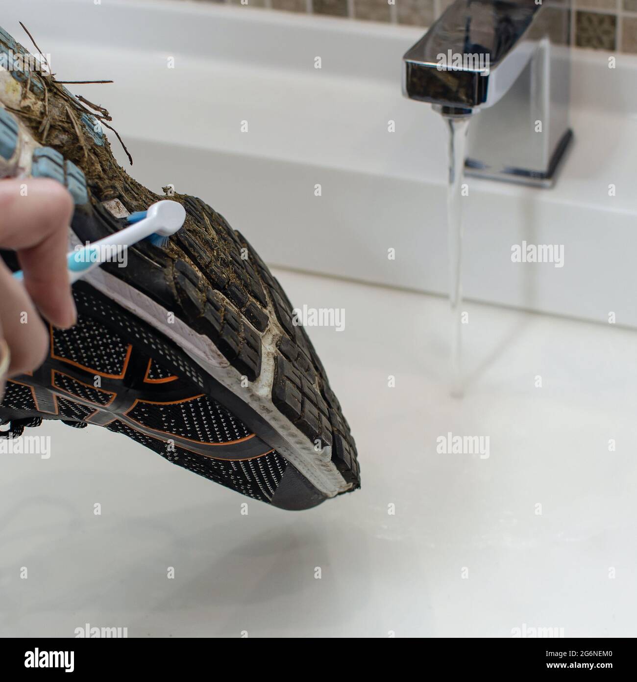 Clean sneakers by hand hires stock photography and images Alamy