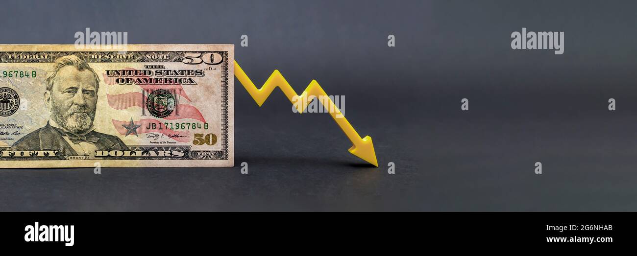 Dollar inflation, dollar depreciation, declining purchasing power of American currency, dollar and financial system collapse concept. Stock Photo