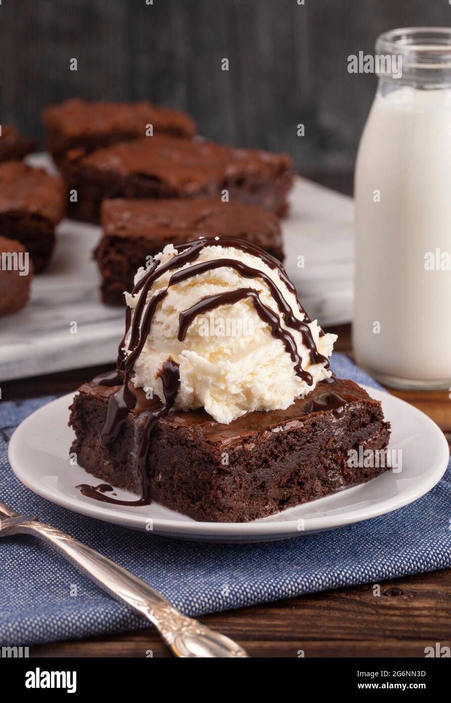 Homemade Double Chocolate Brownies Sundae with Vanilla Ice Cream on Top