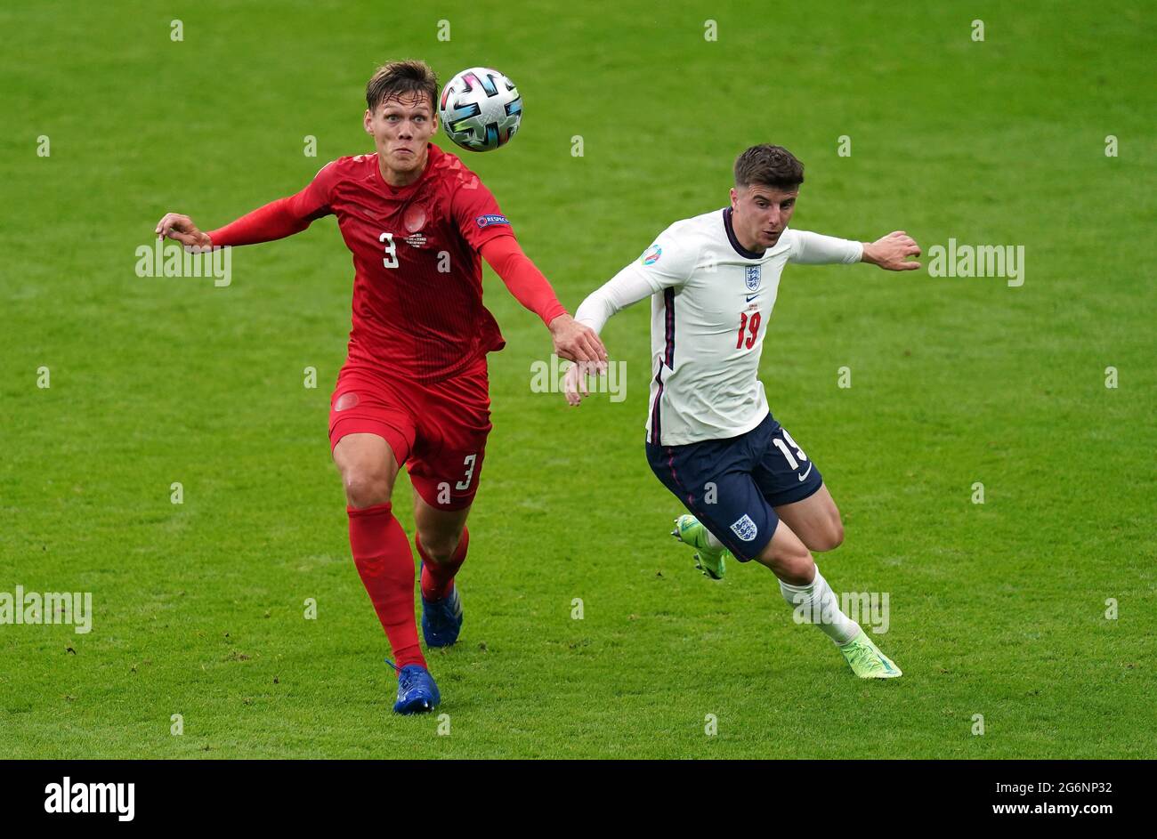 Vestergaard Denmark's Jannik Vestergaard (left) and England’s Mason Mount battle ...