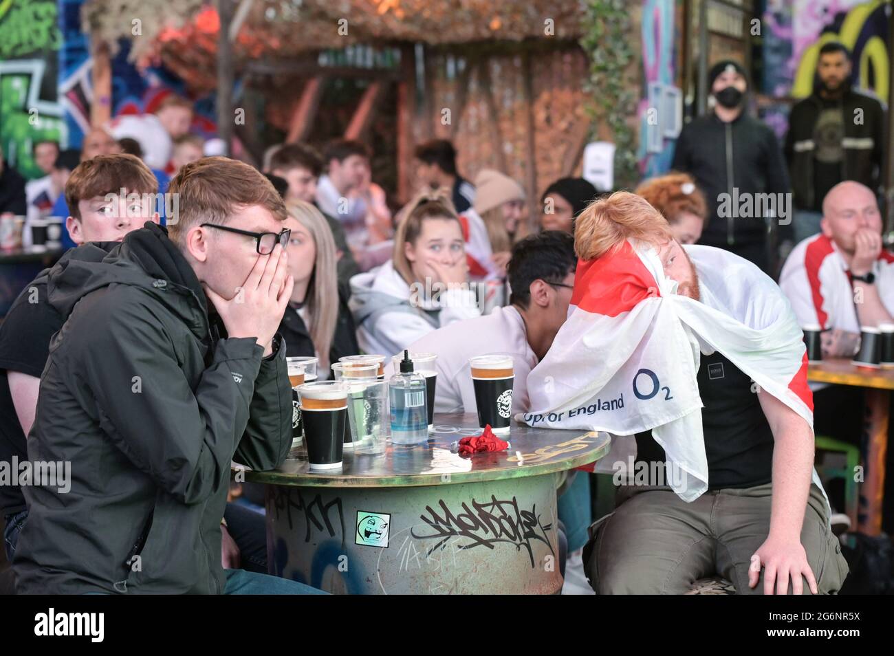 Digbeth, Birmingham July 7th 2021 Fans heartache as Denmark score against England in the Euro 2020 Semi Finals. The fans watched under railway arches at The Big Fang popup bar in Birmingham city centre. Pic by Sam Holiday/Alamy Live News Stock Photo