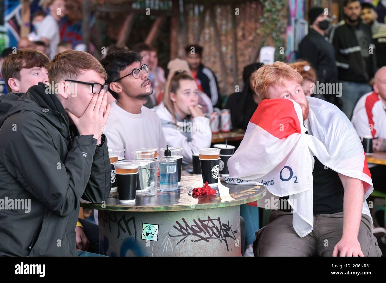 Digbeth, Birmingham July 7th 2021 Fans heartache as Denmark score against England in the Euro 2020 Semi Finals. The fans watched under railway arches at The Big Fang popup bar in Birmingham city centre. Pic by Sam Holiday/Alamy Live News Stock Photo
