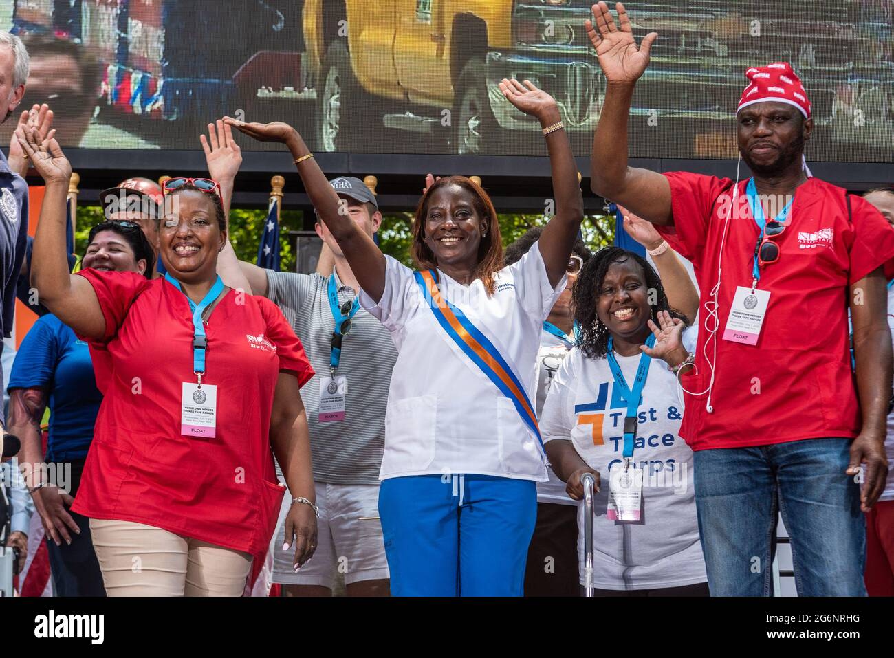 New York City, United States. 07th July, 2021. Sandra Lindsay (white shirt), the Queens nurse and the first person to be inoculated with the Pfizer COVID-19 vaccine, enjoys the Hometown Heroes Ticker-Tape Parade in New York City on July 7, 2021. (Photo by Gabriele Holtermann/Sipa USA) Credit: Sipa USA/Alamy Live News Stock Photo