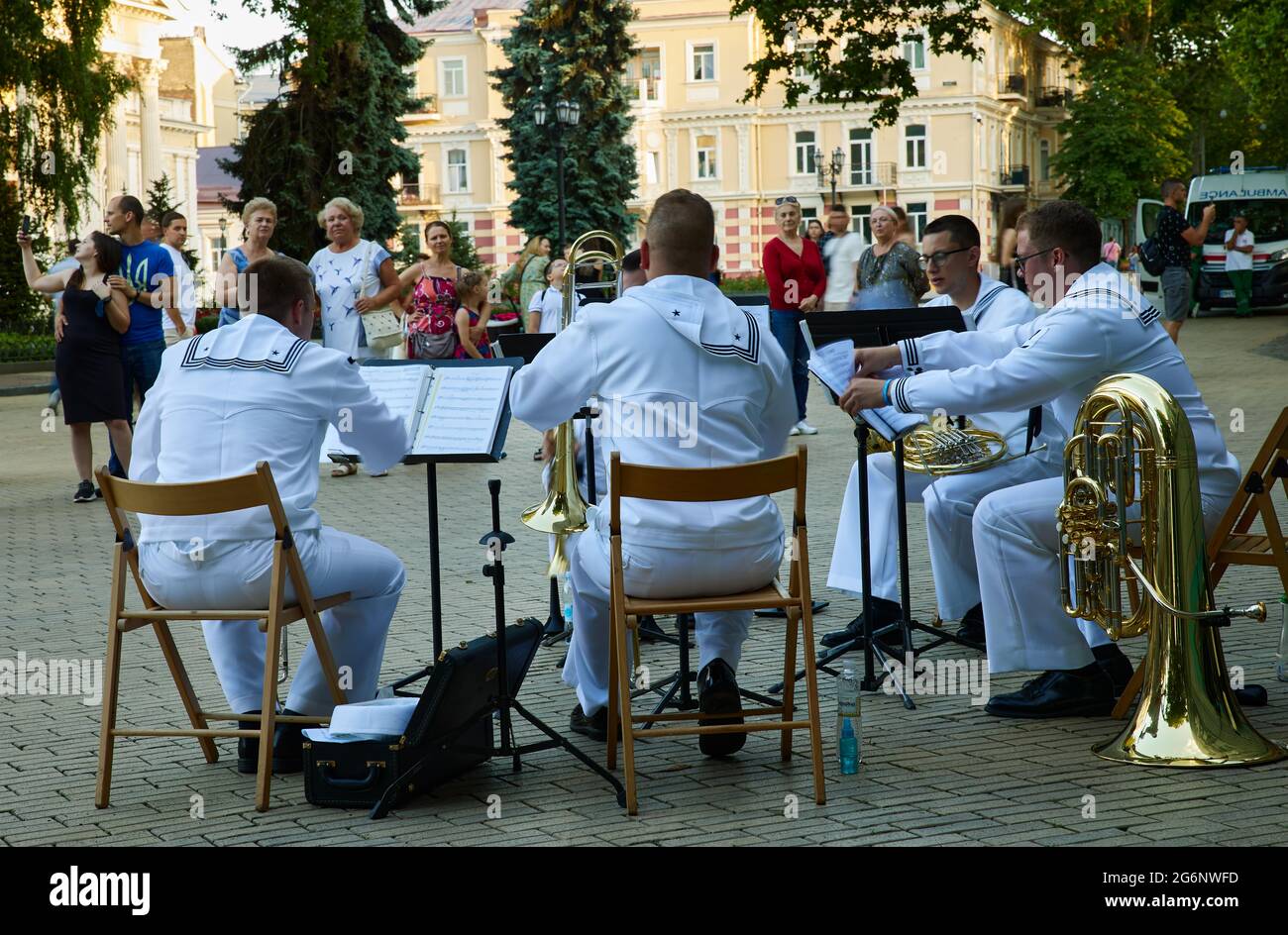 The US Navy brass quintet of the US 6-th Fleet Orchestra plays on the Dumskaya square of Odessa, Ukraine. Summer time, natural light. Stock Photo