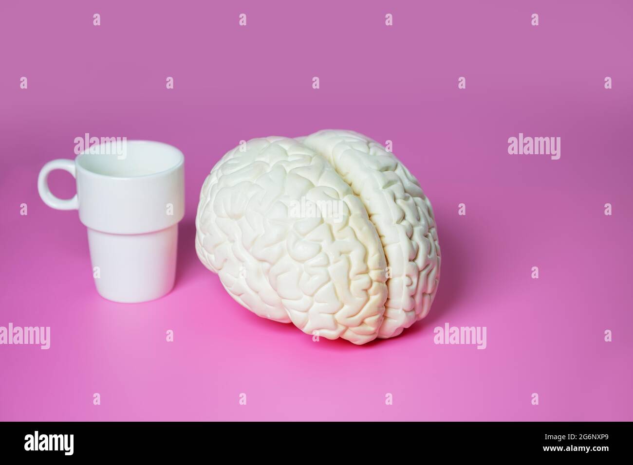 Caffeine effect concept brain and coffee cup Stock Photo Alamy