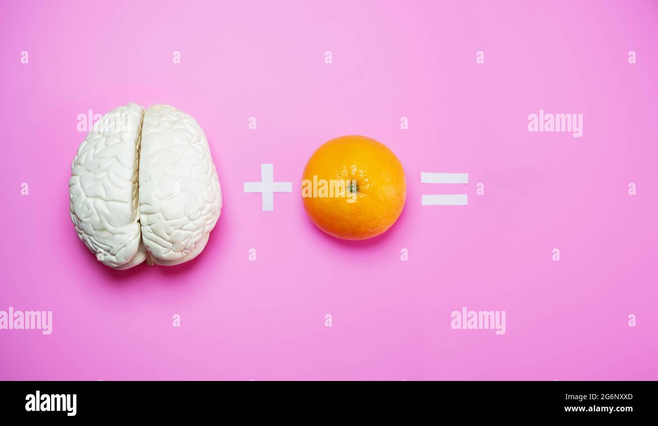 Brain and orange the need of fruits for thinking Stock Photo Alamy