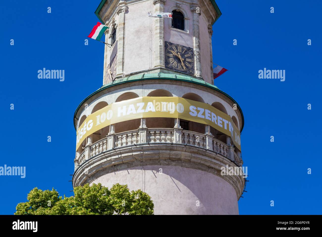 Firewatch Tower with banner 'Huseg-Haza-Szeretet' centenary of Sopron plebiscite, Sopron, Hungary Stock Photo