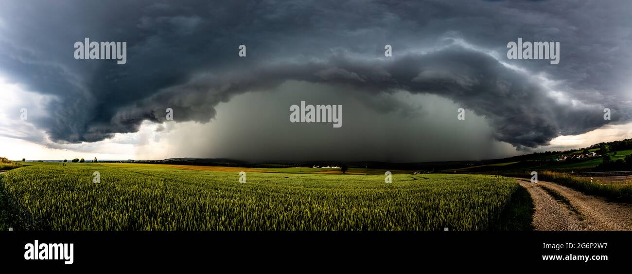 A violent Thunderstorm with heavy Rain, Storm and Hail is coming Stock Photo