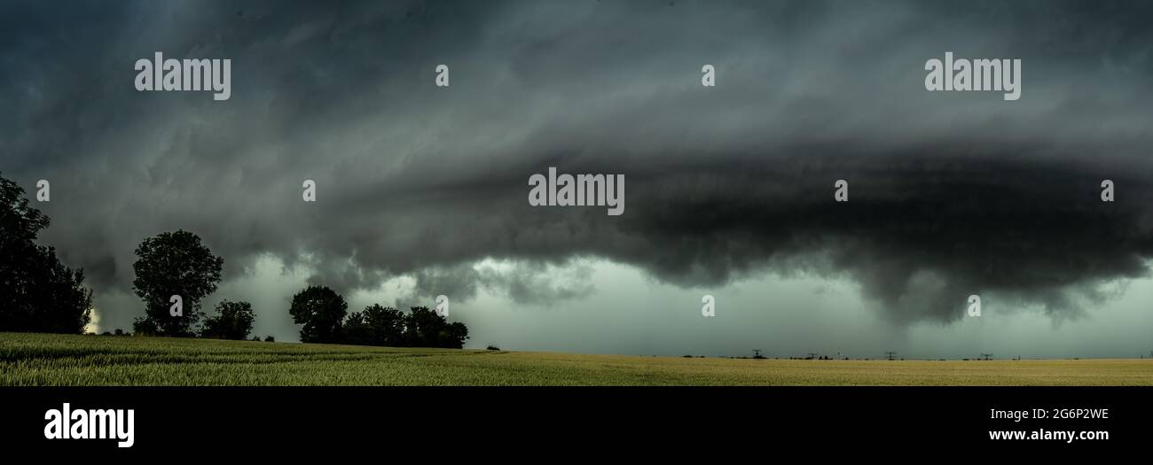 A violent thunderstorm is coming with heavy rain Stock Photo