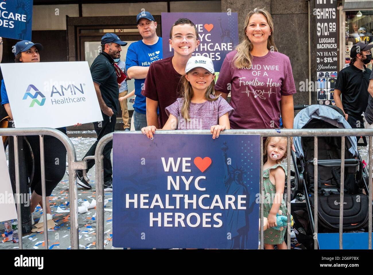 New Yorkers line up in the Canyon of Heroes in Lower Manhattan to cheer