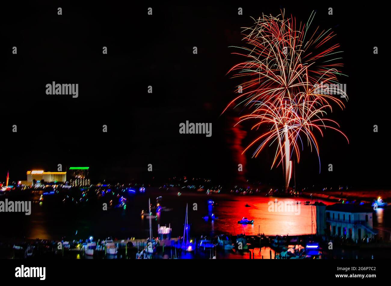 Fireworks explode over Biloxi Bay on the Fourth of July, July 4, 2021
