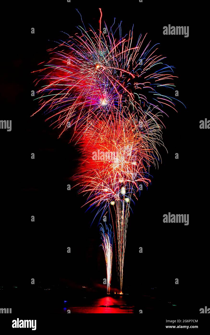 Fireworks explode over Biloxi Bay on the Fourth of July, July 4, 2021