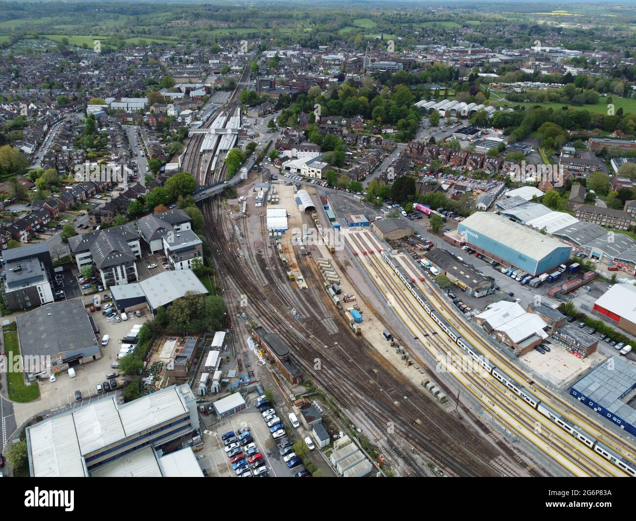 Aerial shot of Horsham Railway Station, Horsham Signal box & Rail sidings, with Horsham Town Centre in the Distance. Stock Photo