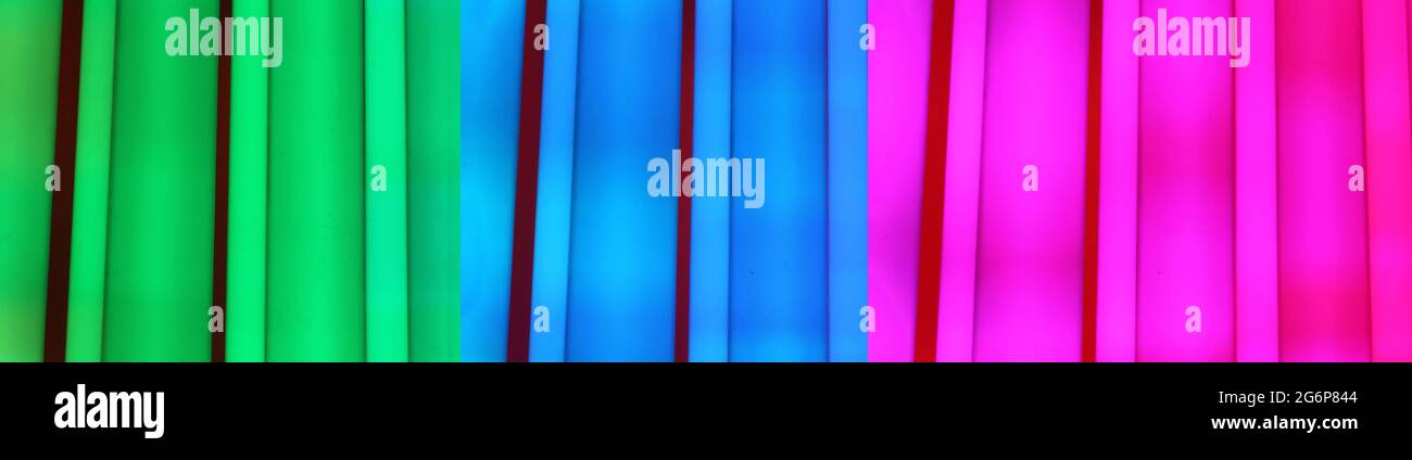 Abstract colorful wall stripes on outside architecture facade Stock Photo