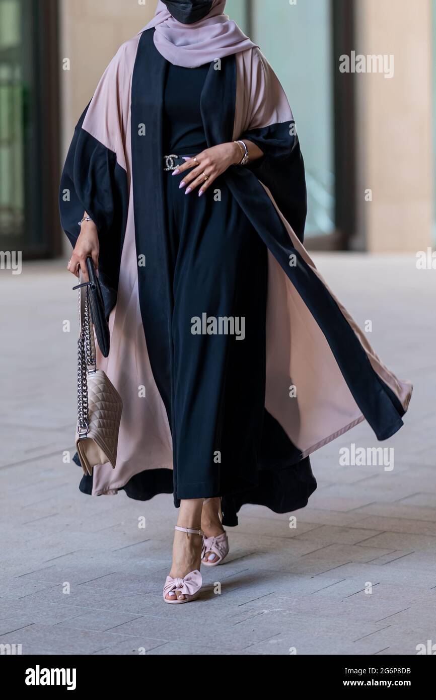 Girl in traditional Abaya in street. No Face Stock Photo