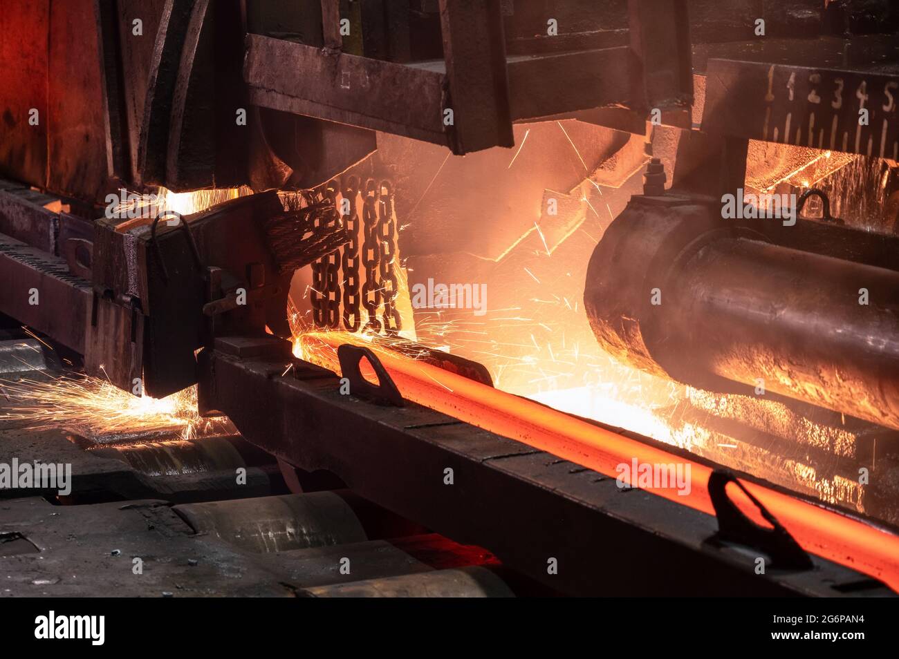 The process of cutting hot rolled steel into lengths Stock Photo Alamy