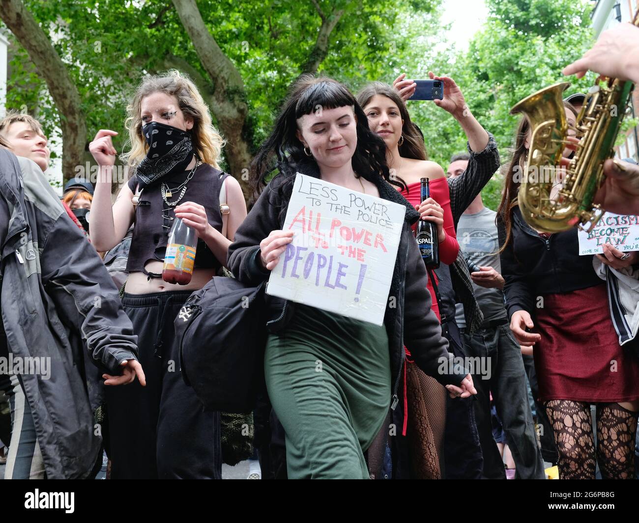 A group of women dance at a 'Kill the Bill' protest held in solidarity with the Gypsy Roma and Traveller communities. Stock Photo