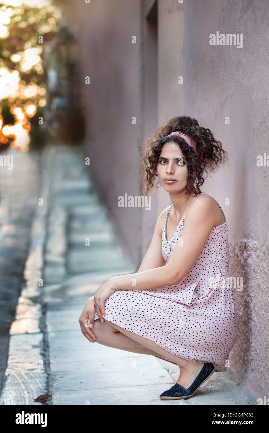 Portrait of a tunisian woman looking camera, casual clothes, outdoors Stock Photo