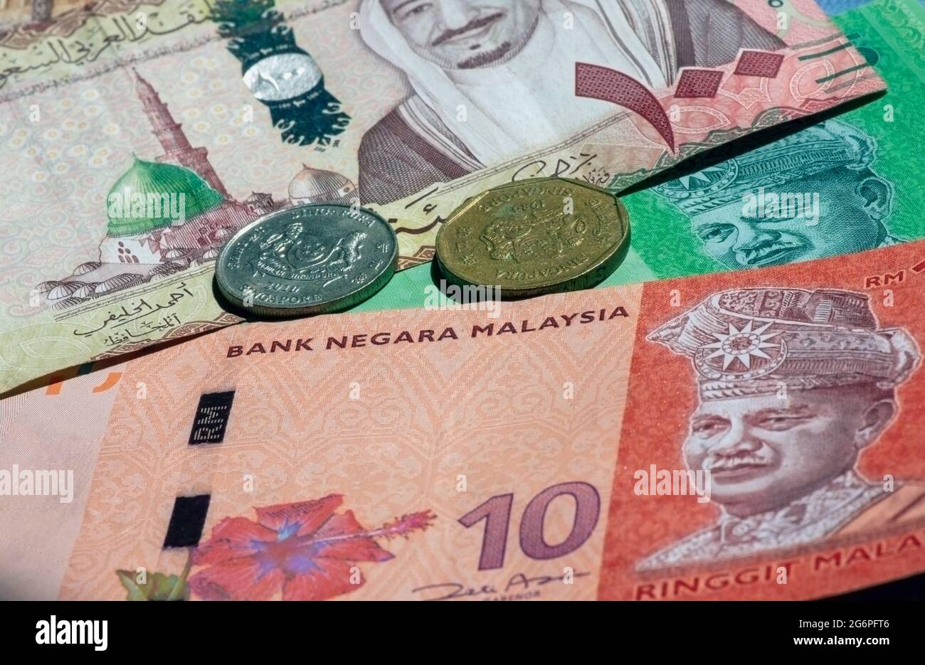 Money, Banknote of Ringgit Malaysia, Singapore dollar and Saudi 