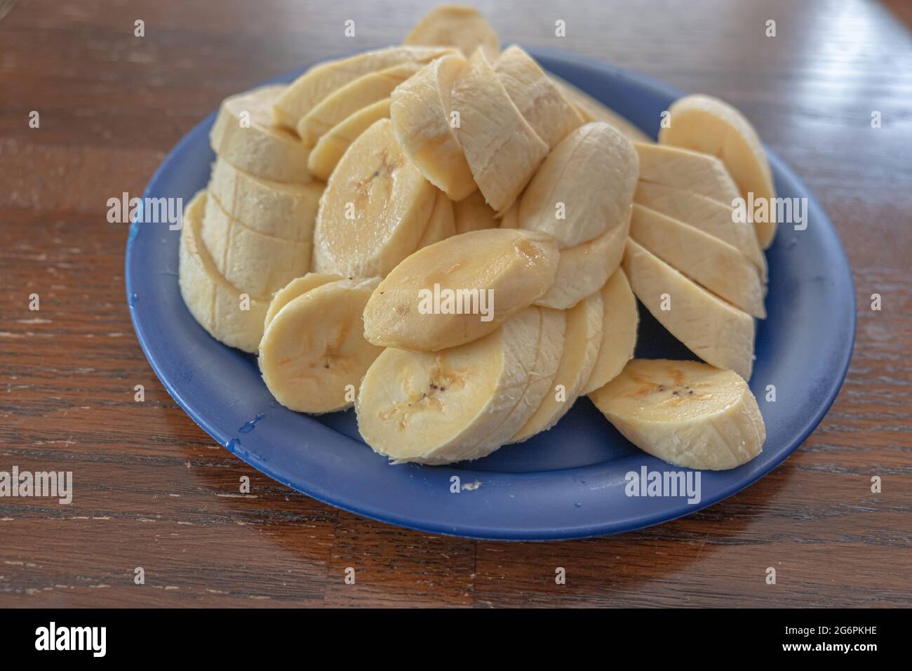 Raw organic Plantain Slices ready to be fried Stock Photo Alamy
