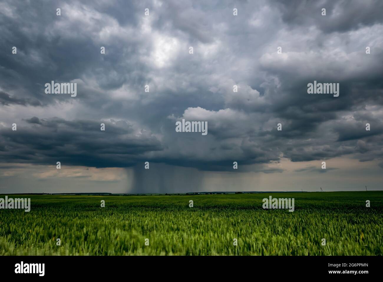 landscape with dark sky with rain clouds before storm. thunderstorm front Stock Photo