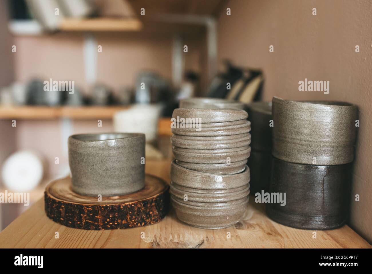 Pottery workshop products on table close up. Handmade, creativity and hobby concept. Stock Photo