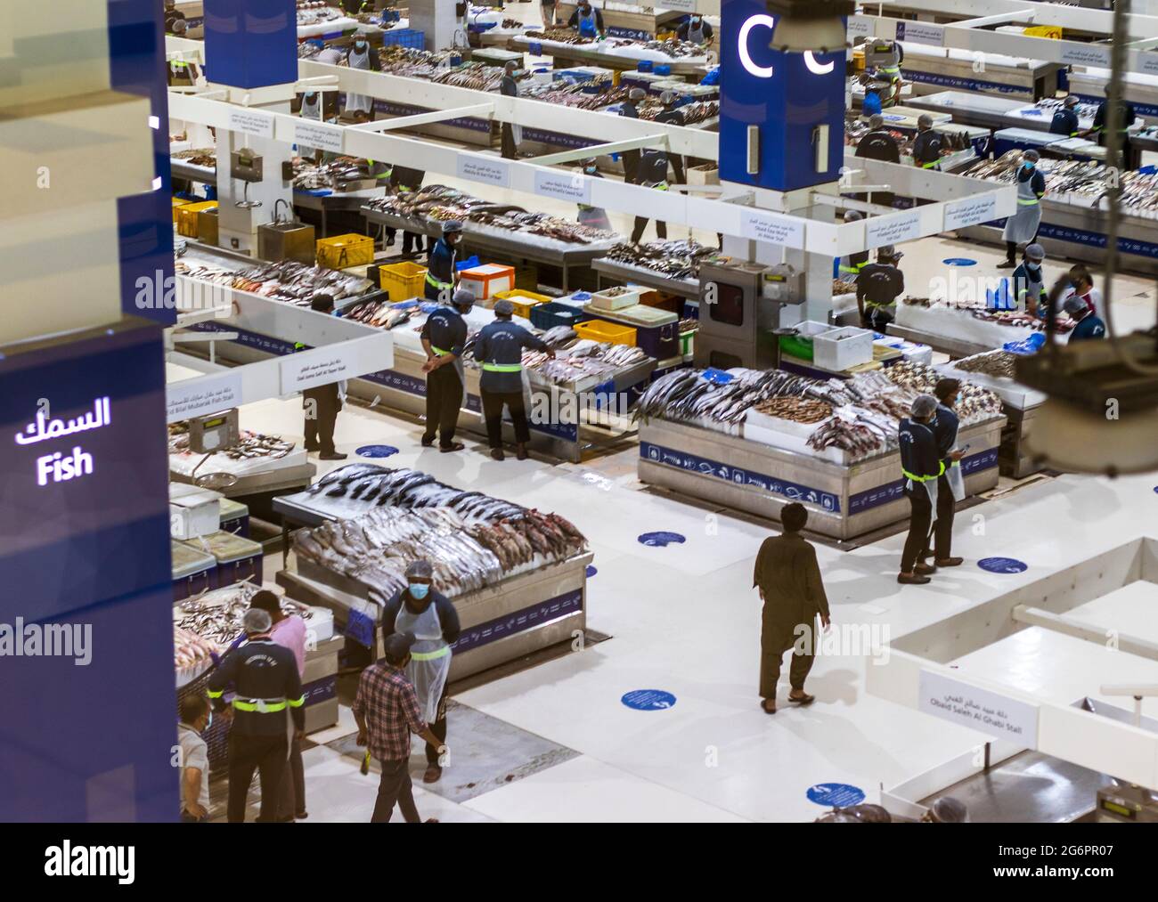 Dubai, UAE - 07.07.2021 - Customers and vendors at Waterfront market ...