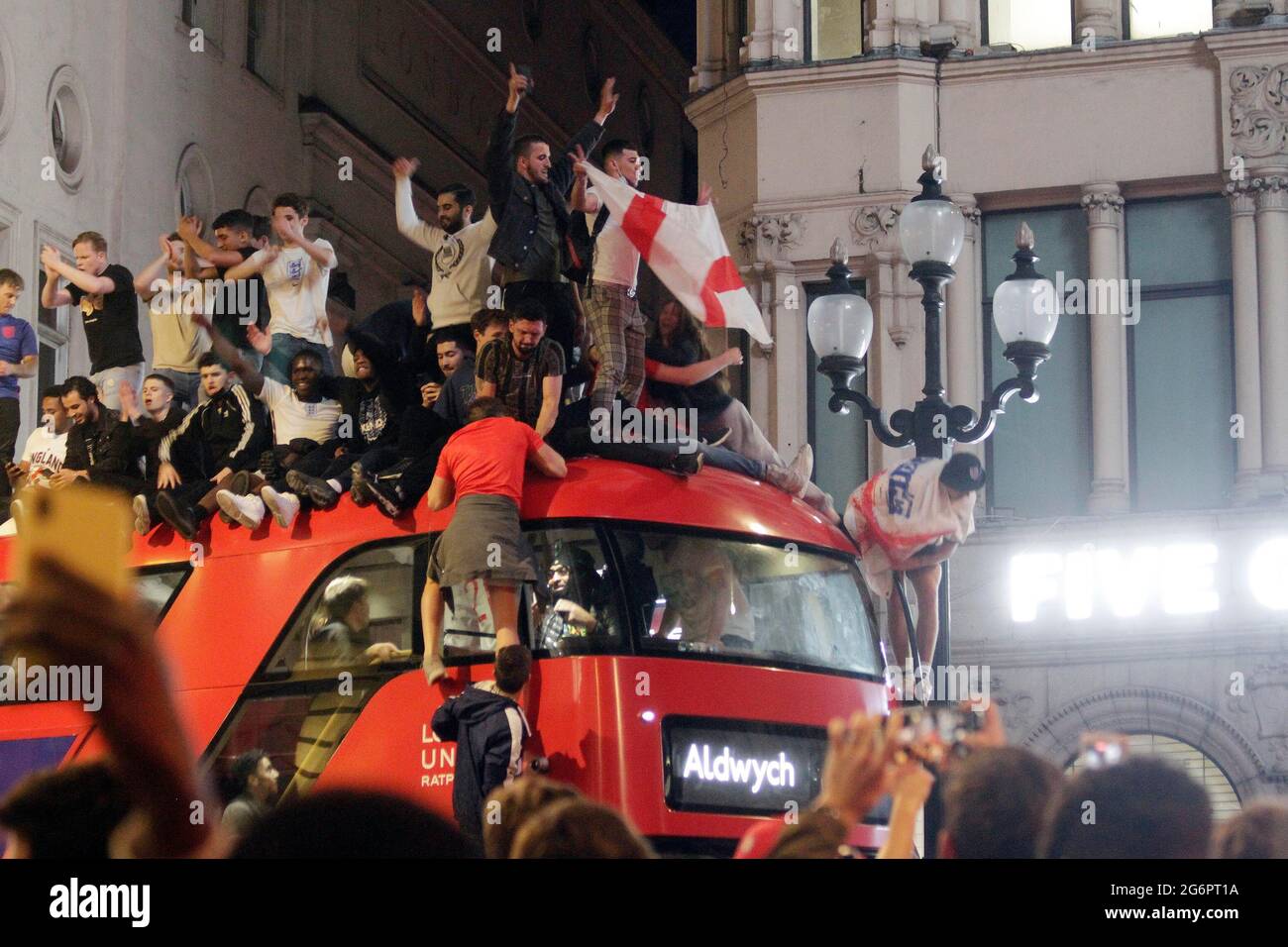 English fans celebrating their team’s winning and going on to the final. It was very nice at Piccadilly Circus and Haymarket everybody was singing and dancing and some people got on the tope of a red bus and were dancing it was very nice and they could still be there 7/7/2021 blitz pictures Stock Photo