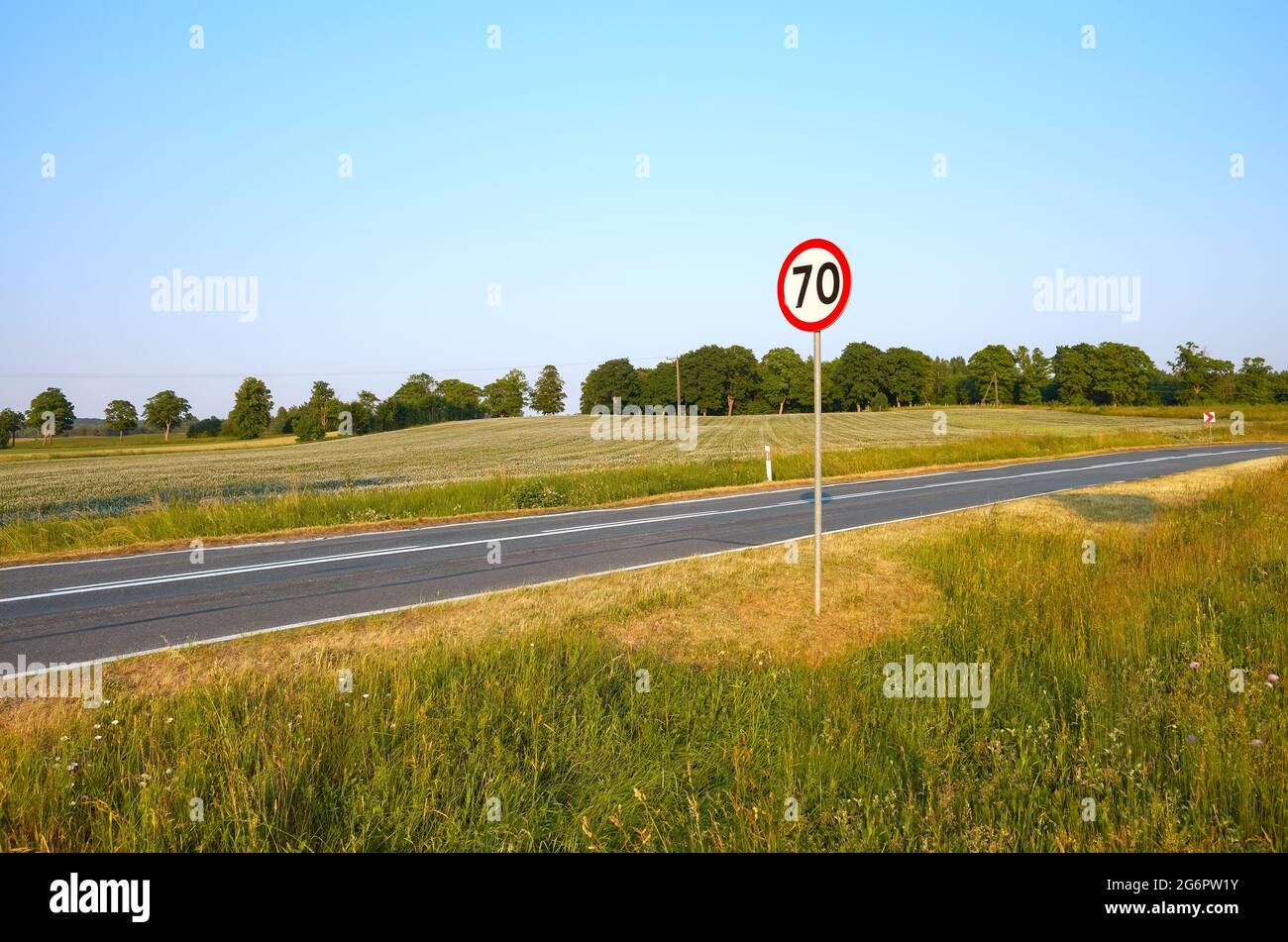 Speed limit sign by a countryside road, Poland Stock Photo Alamy