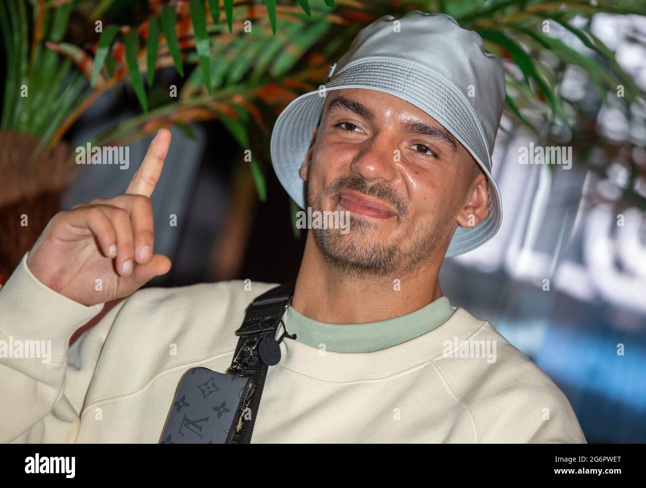 Berlin, Germany. 08th July, 2021. German rapper Capital Bra stands at the  unveiling of his wax figure at Madame Tussauds Berlin. Credit: Christophe  Gateau/dpa/Alamy Live News Stock Photo - Alamy