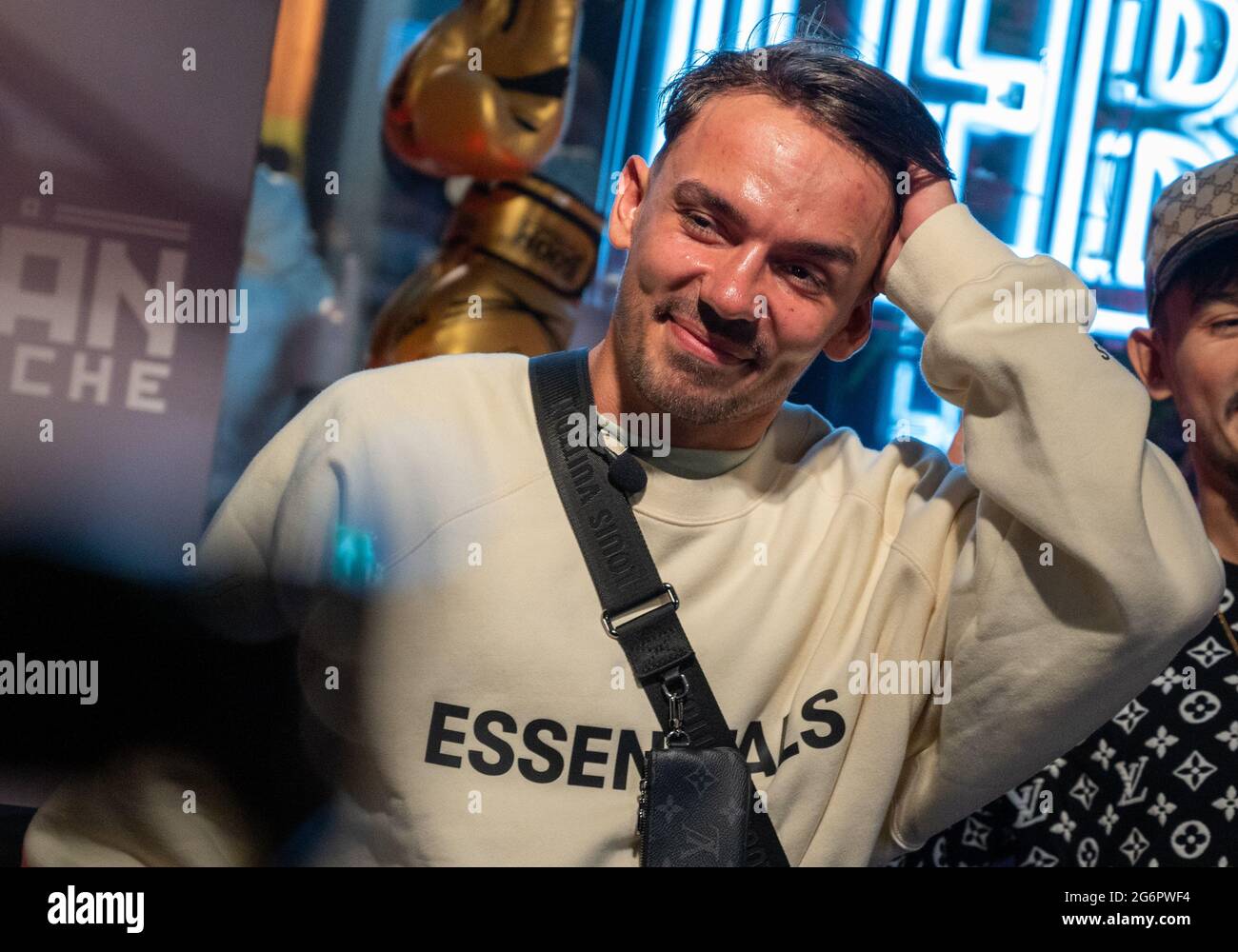 Berlin, Germany. 08th July, 2021. German rapper Capital Bra stands at the  unveiling of his wax figure at Madame Tussauds Berlin. Credit: Christophe  Gateau/dpa/Alamy Live News Stock Photo - Alamy