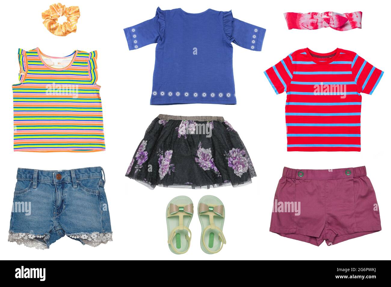 Collage set of little girls summer clothes isolated on a white