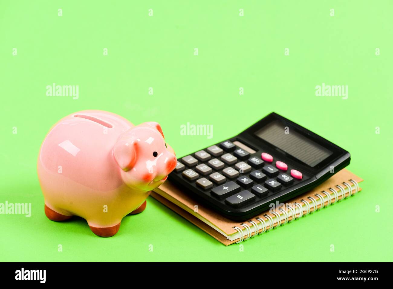 moneybox with calculator. Piggy bank. bookkeeping. financial report. planning counting budget