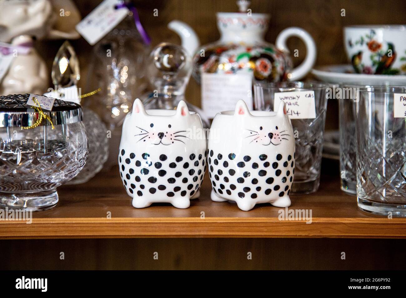 Cups and crystal glasses at an antique shop (Hampton Court Emporium, East Molesay, UK) Stock Photo