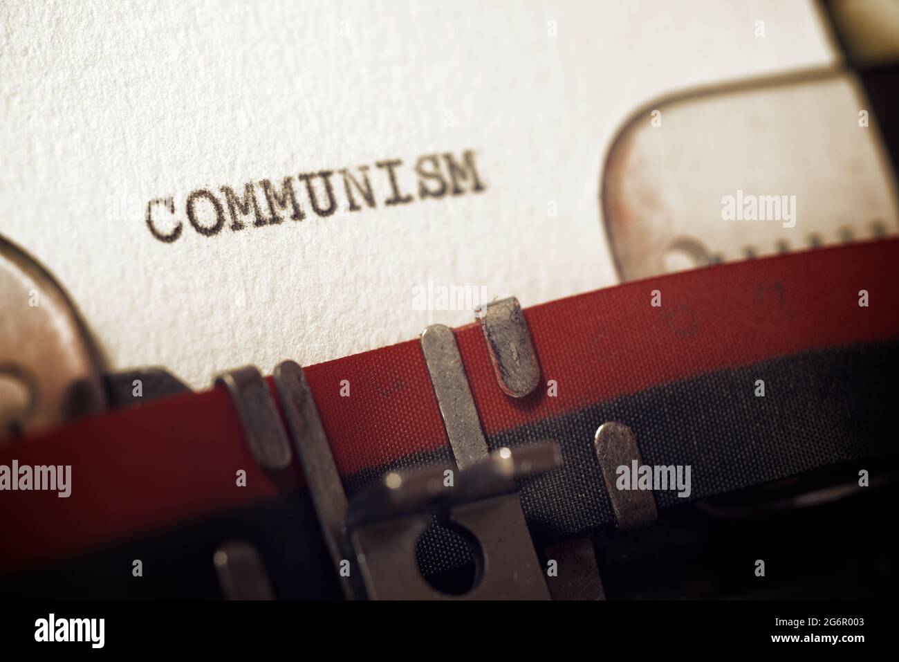 The word communism written with a typewriter. Stock Photo