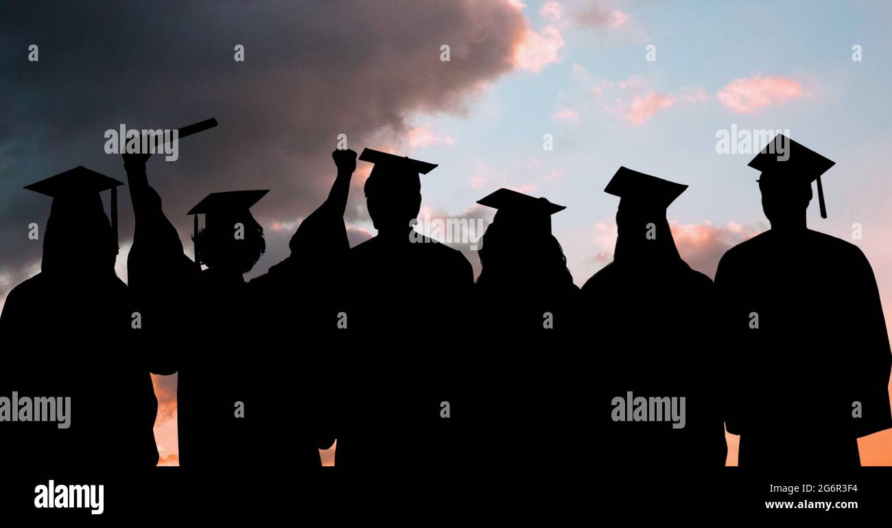 Composition of silhouettes of graduated students in caps and gowns against sunset sky Stock Photo