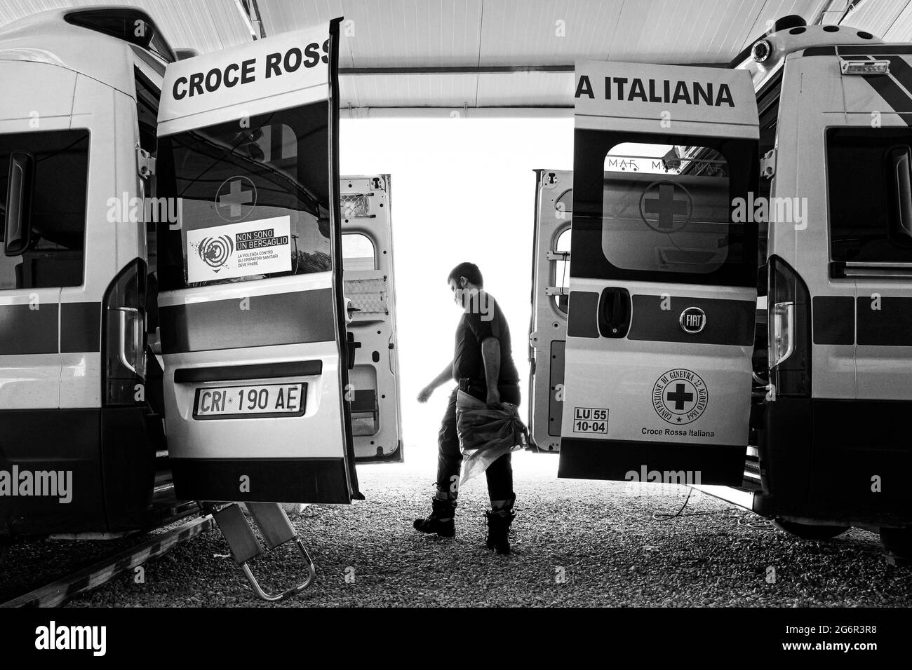 LUCCA, TUSCANY - ITALY 2020:Temporary volunteers of the Italian Red Cross on ambulance Stock Photo