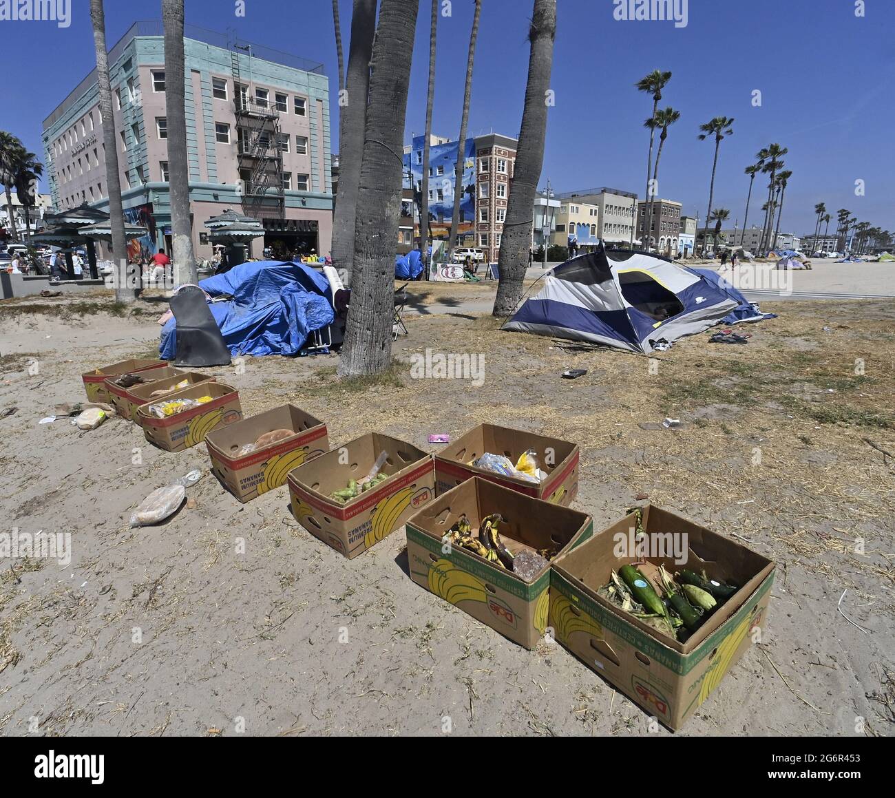 Los Angeles, United States. 08th July, 2021. Homeless encampments are seen along the bike path in the Venice Beach area of Los Angeles on Wednesday, July 7, 2021. Fliers posted by the city outlined a five-week 'phased resumption of normal operations' with a 'comprehensive beachfront cleaning' of the area, which is under the jurisdiction of the city Recreation and Parks Department. The warning said the 'unhoused residents currently living in the park will be offered housing.' Photo by Jim Ruymen/UPI Credit: UPI/Alamy Live News Stock Photo