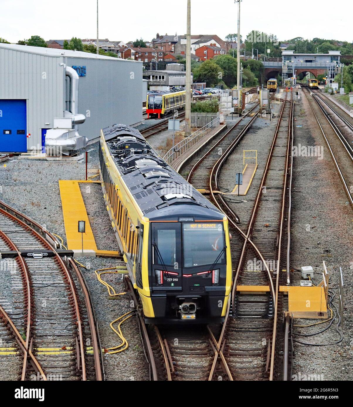 One of the new Mersey Rail trains, built by Stadler, arrives back into the maintaince depot at Kirkdale from a test run to Southport and back. Stock Photo