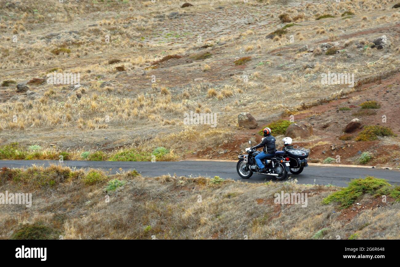 Classic  Motorcycle and Sidecar with passenger  used to give Island tours of Madeira. Stock Photo