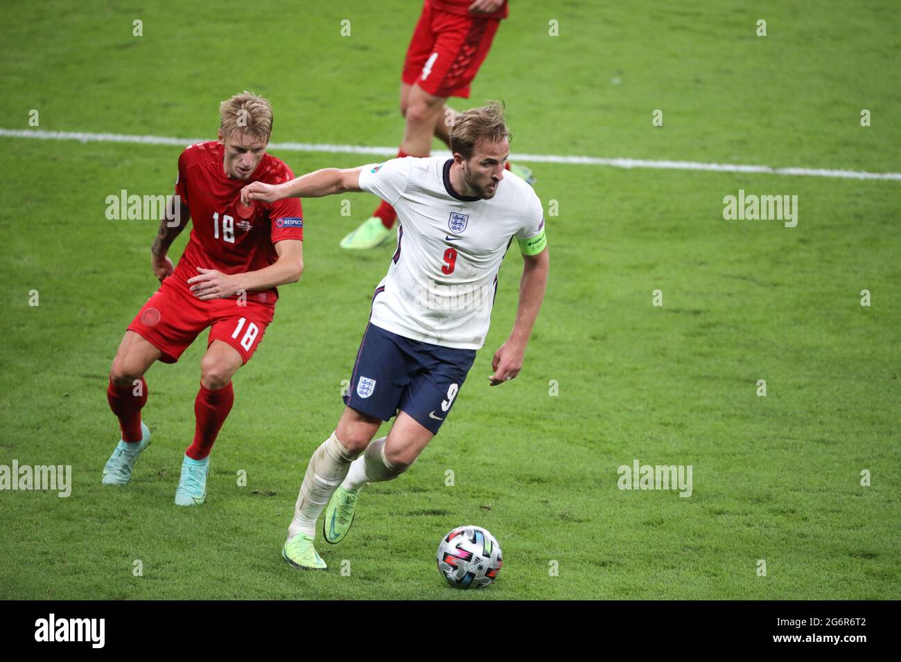 London, UK. 07th July, 2021. Daniel Wass (D) Harry Kane (E) at the