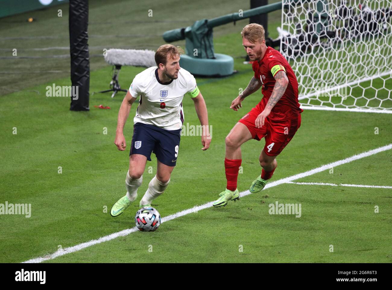 London, UK. 07th July, 2021. Harry Kane (E) Simon Kjaer (D) at the