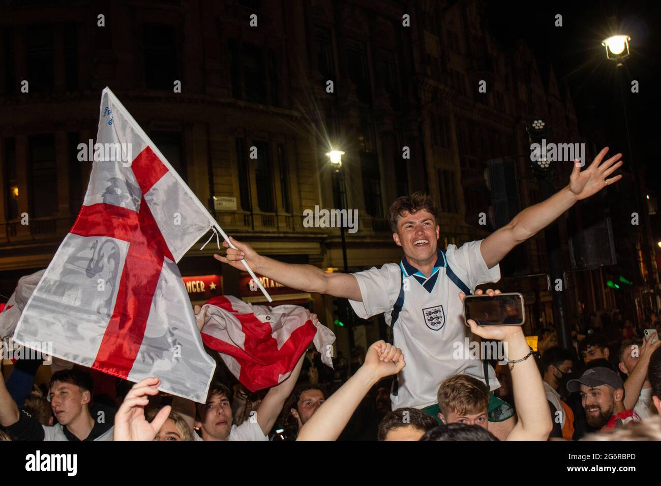 LONDON, ENGLAND, JULY 07 2021, England fans celebrate winning England Vs Denmark Euros 2020 semi final match, Credit: Lucy North/Alamy Live News Stock Photo
