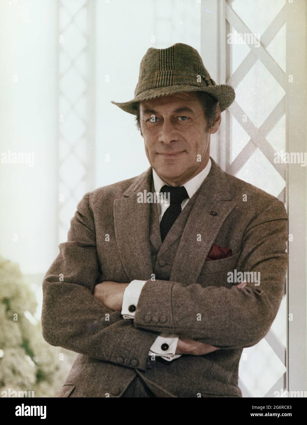 REX HARRISON Colour Portrait as Professor Henry Higgins in MY FAIR LADY 1964 director GEORGE CUKOR from the Broadway musical adapted from the play Pygmalion by George Bernard Shaw screenplay book and lyrics Alan Jay Lerner  music Frederick Loewe production design and costumes Cecil Beaton producer Jack L.Warner Warner Bros. Stock Photo