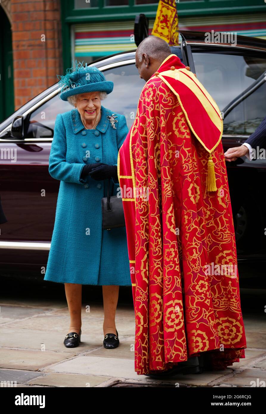 Britain's Queen Elizabeth meets Dean of Manchester, Rogers Govender, as she visits Manchester Cathedral, in Manchester, Britain, July 8, 2021. Christopher Furlong/Pool via REUTERS Stock Photo