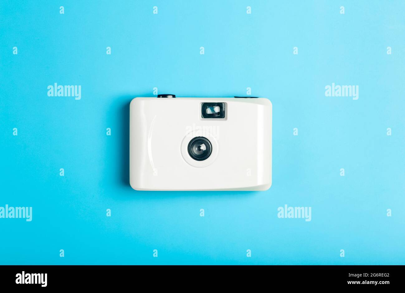 Film camera on a color minimal background. Photography, lifestyle concept. High quality photo Stock Photo