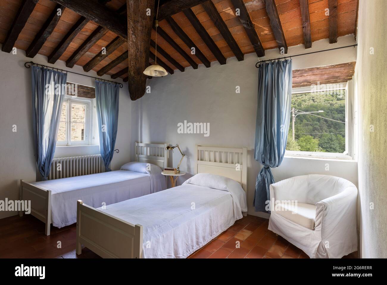 Interior of an old bedroom, almost antique. Typical Italian style. Nobody inside Stock Photo